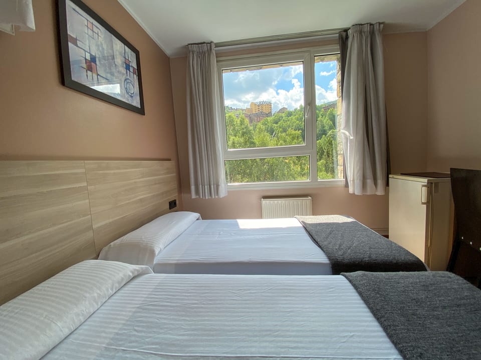 Triple Room (3 adults) | Desk, blackout drapes, soundproofing, free WiFi