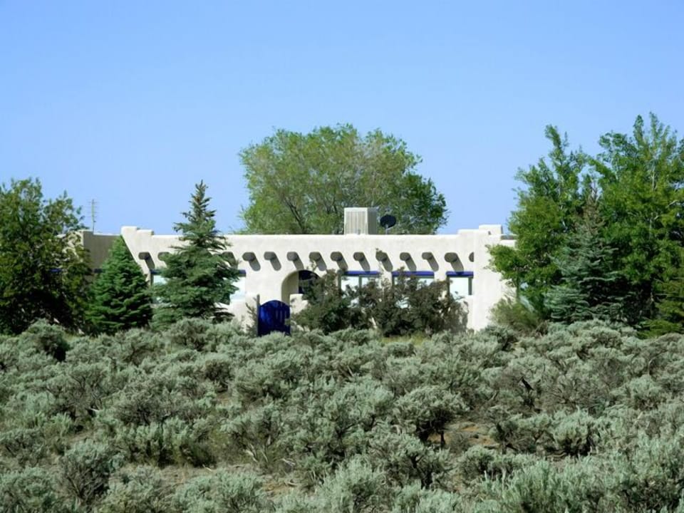 Main house surrounded by native southwest sage