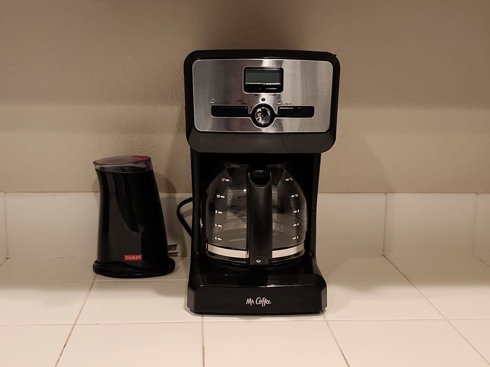 coffee maker and coffee grinder provided