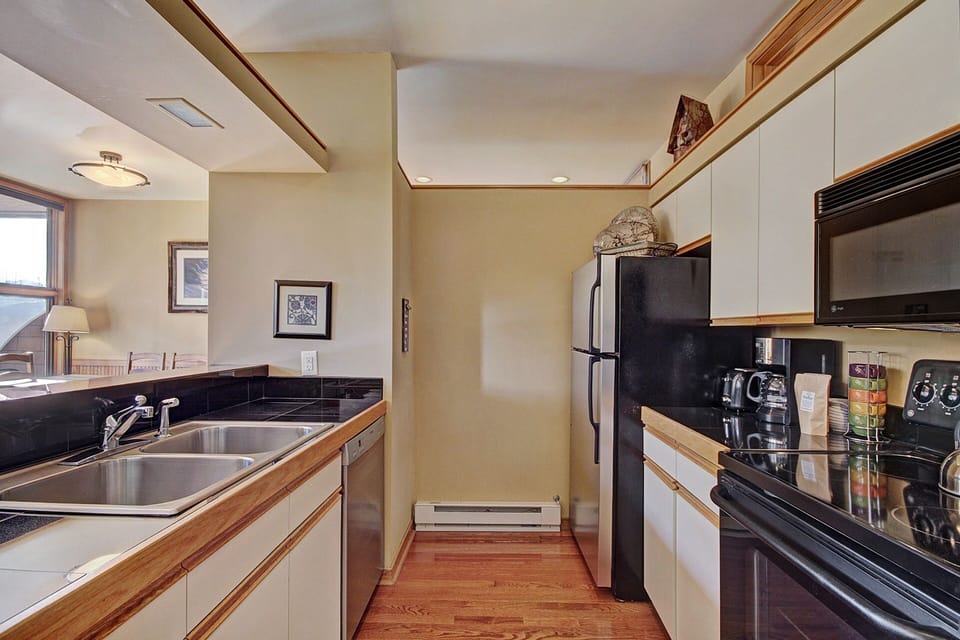 The kitchen is stocked with your basic needs for cooking as well as complimentary SkyRun coffee.