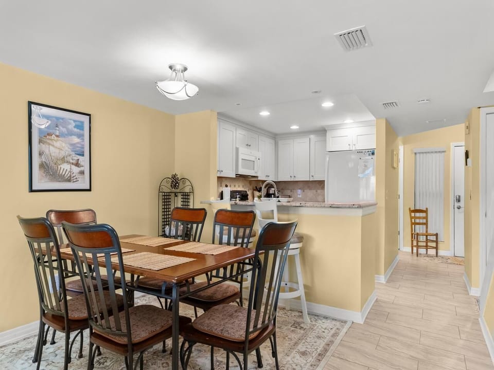Cozy dining area with open kitchen for family meals