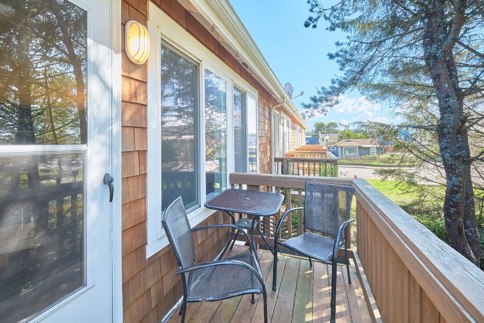 Deck on 2nd Floor - two chairs and a table so you can sit back and enjoy the scenery