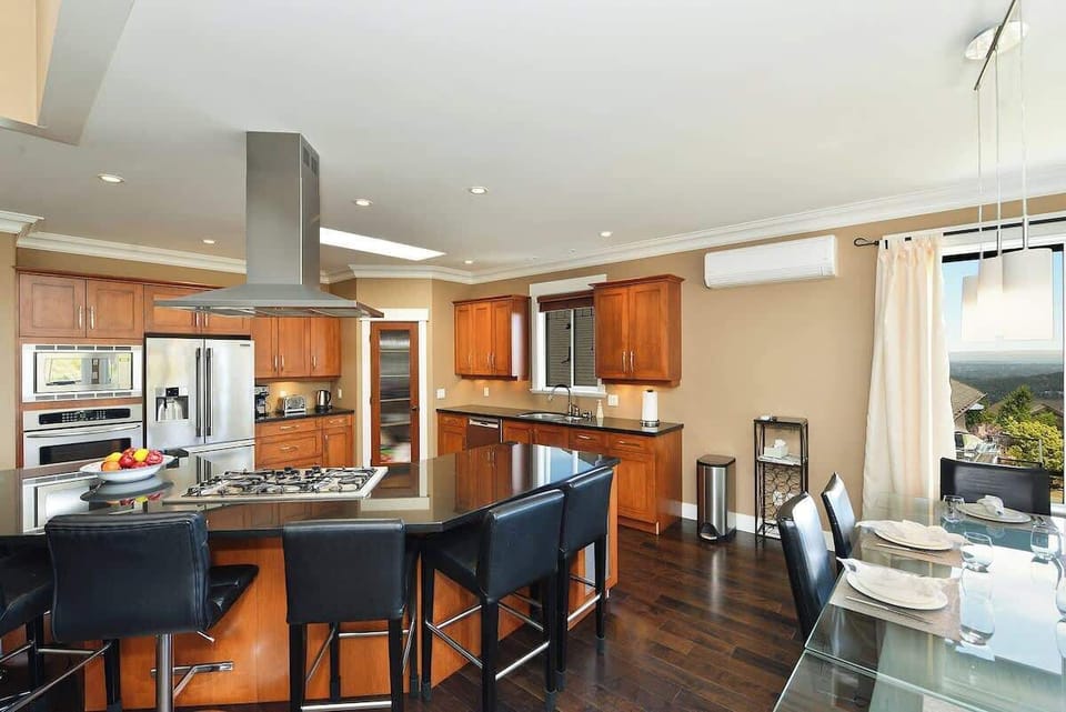 Upper Main level kitchen and dining space. 