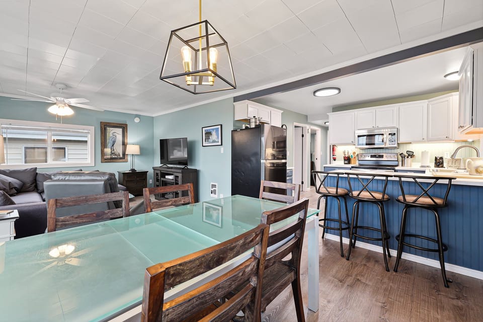 Gather for a family meal around the dining table.