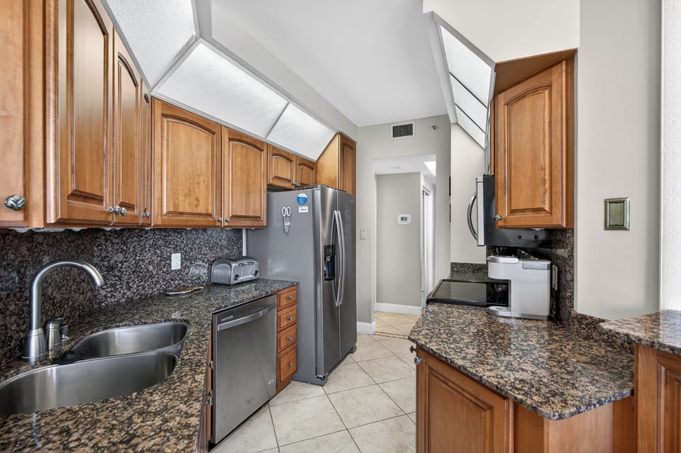 The kitchen is open to the living room to keep everyone connected