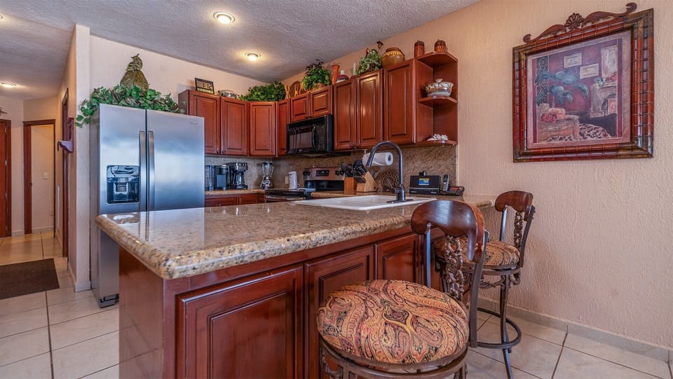 Fully furnished kitchen with many amenities including Keurig coffee maker.