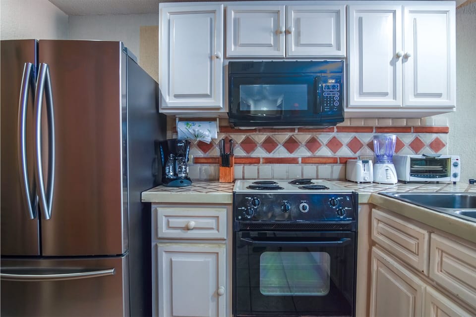 Close look at the kitchen appliances.