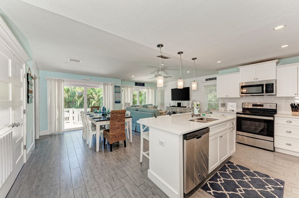Kitchen facing towards dining and living room