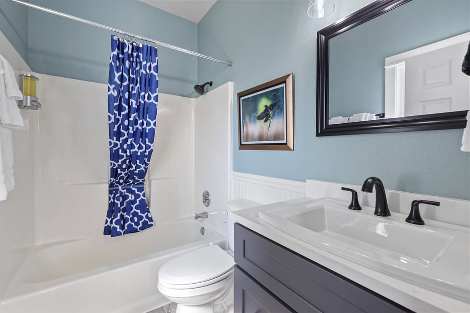 Family-Friendly Bath – A convenient tub/shower combo for guests of all ages.