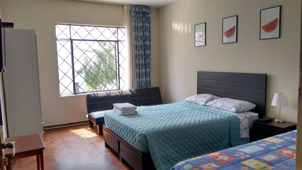 Twin Room, Shared Bathroom | Iron/ironing board (on request), WiFi (free), bed sheets