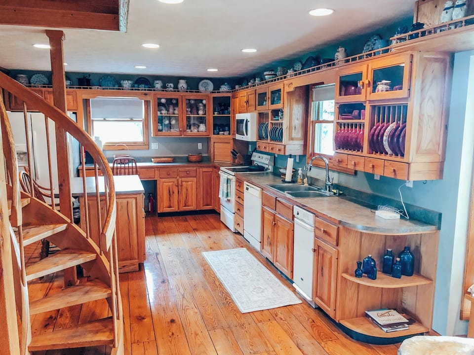 Hand made Bybee Pottery is on display in the entire kitchen. 