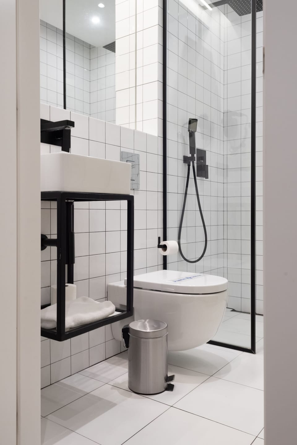 Shower, rainfall showerhead, designer toiletries, hair dryer