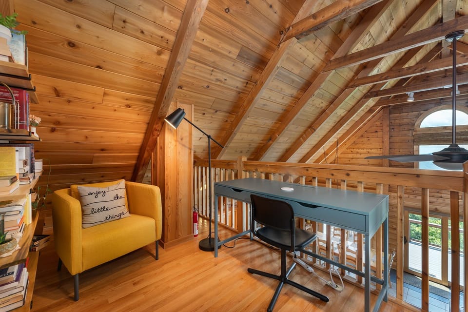 Upper-level loft with remote laptop working station.