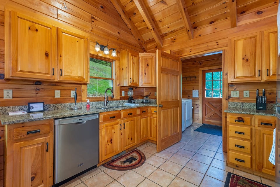 Kitchen with dishwasher & drip-style coffeemaker.
