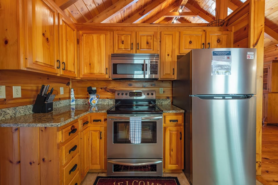 Kitchen with dishwasher & drip-style coffeemaker.