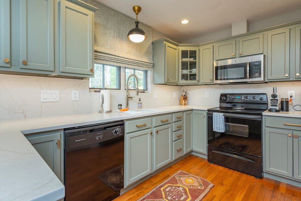 Updated kitchen with dishwasher, tea kettle, toaster oven, and 2 types of coffeemakers (drip-style and Nespresso).