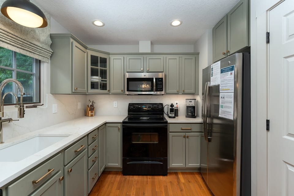 Updated kitchen with dishwasher, tea kettle, toaster oven, and 2 types of coffeemakers (drip-style and Nespresso).
