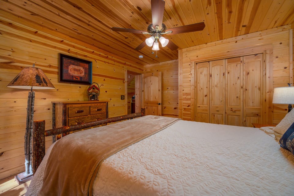 Lower-level bedroom with queen-size bed