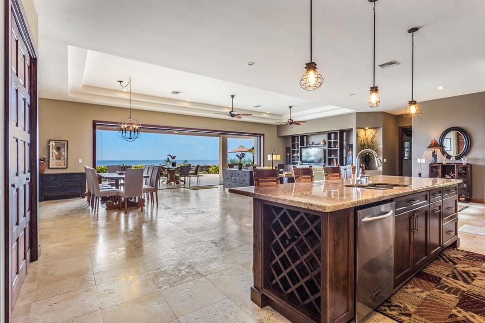 Open Concept Design with Island and Wine Rack in the Kitchen