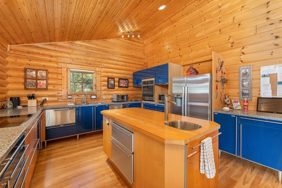 Luxury kitchen with stainless steel appliances.