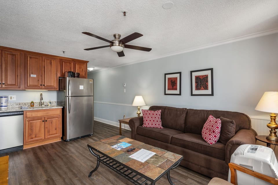 The open floor plan and comfortable seating makes it perfect for gathering.  Guest Review From Justice McFall: "The condo was spotless, spacious, and in a fantastic location!" 