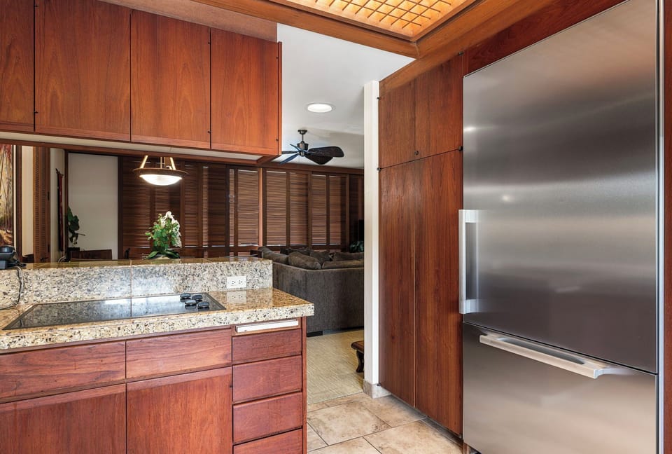 Kitchen with Stove and Bar Perfect for Entertaining