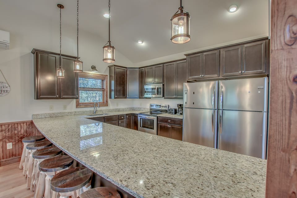 Kitchen with Appliances and Bar Seating