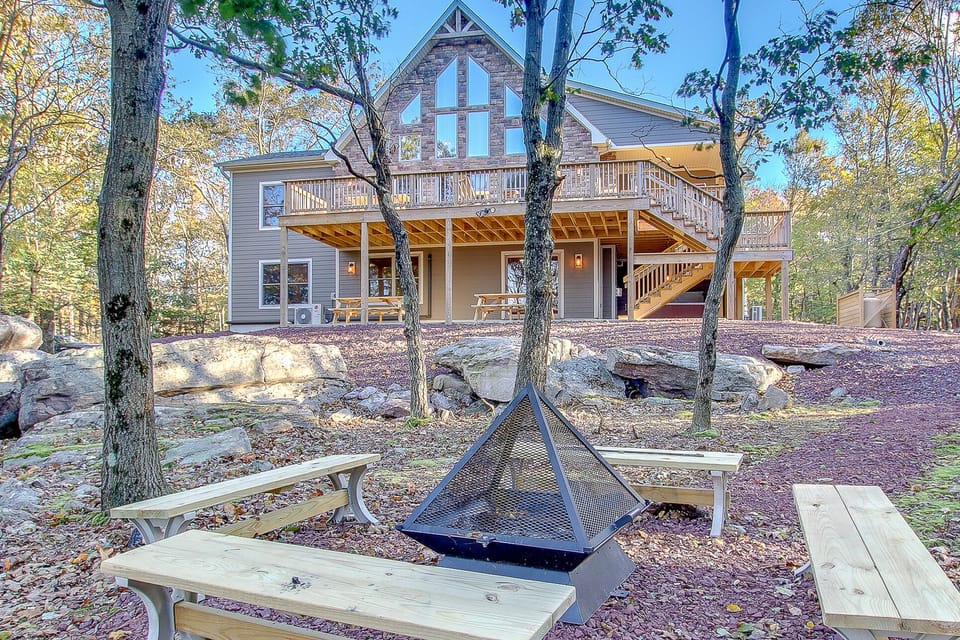 Fire Pit and Benches Outside our Poconos Luxury Rental