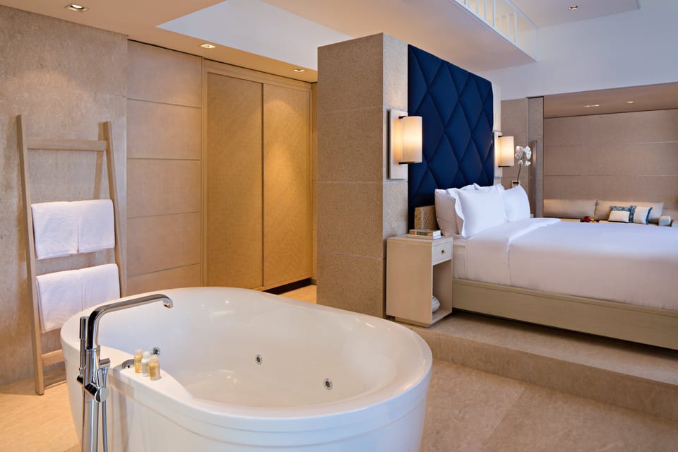 Shower, rainfall showerhead, designer toiletries, hair dryer