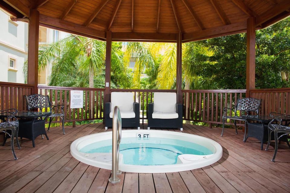 Hot tub under the gazebo. perfect spot for an evening cocktail. 