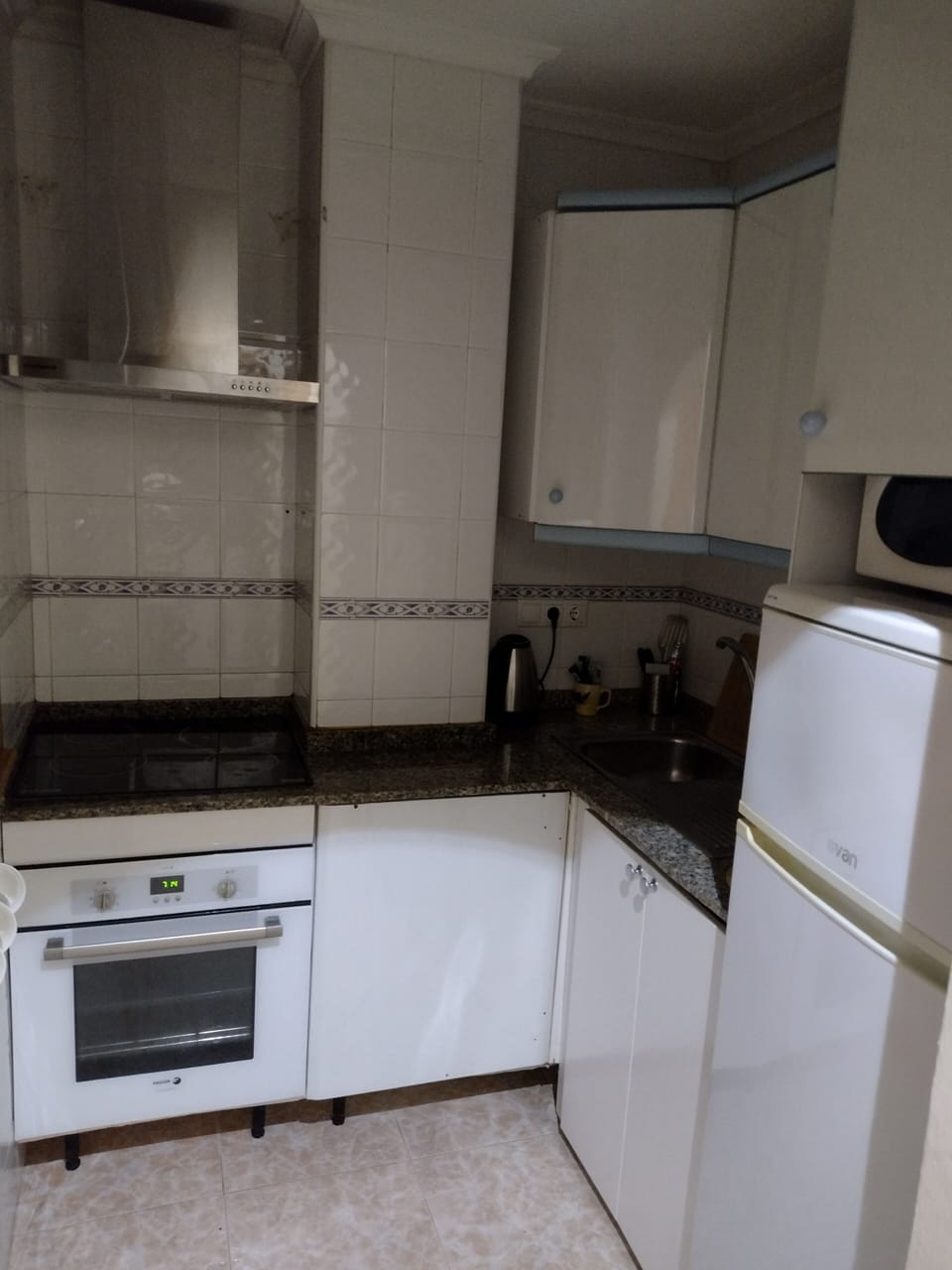 The fully equipped kitchen