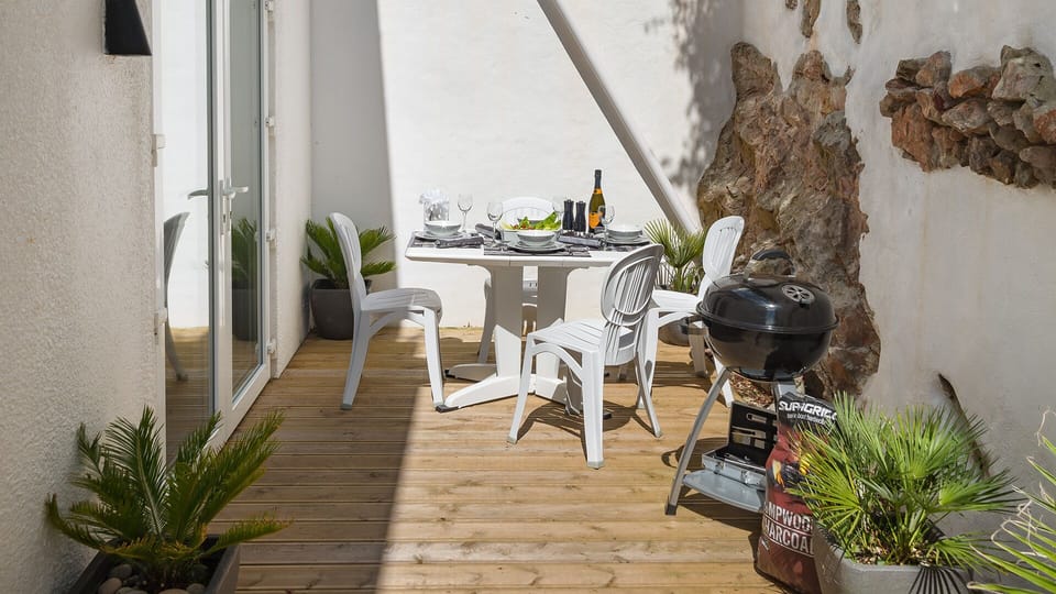 Outside DINING TABLE and BARBECUE on the DECKING