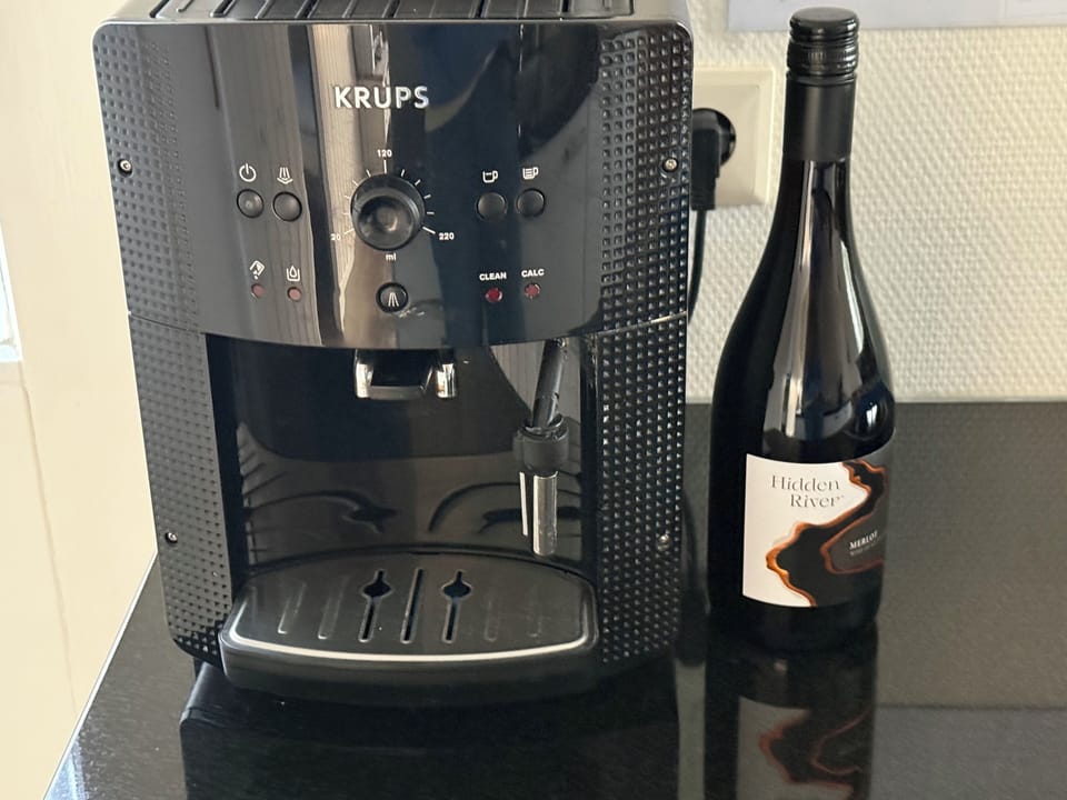 Espresso machine and a bottel of wine when you arrive.