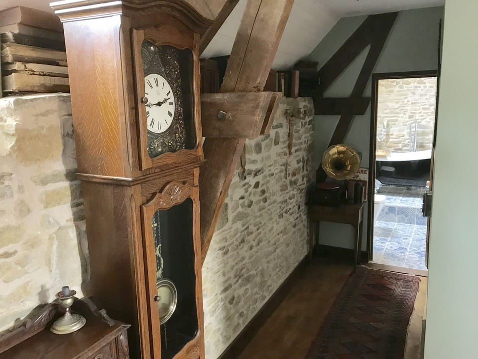 The corridor on the middle floor, through to the bathroom and bedrooms.