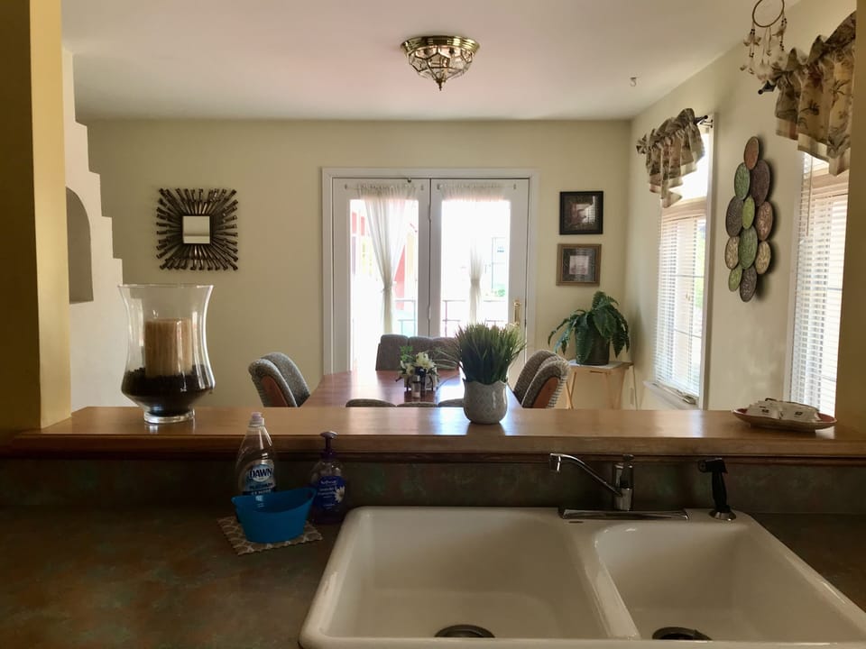 Kitchen opens up into the dining room area, great for family dining. 