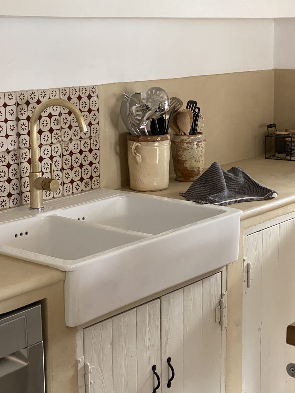 Antique local sourced tiles make this kitchen the real deal