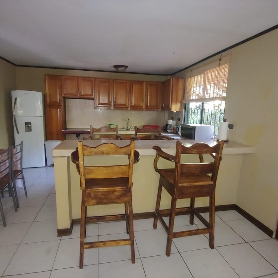 The Fully equipped kitchen from the living room.