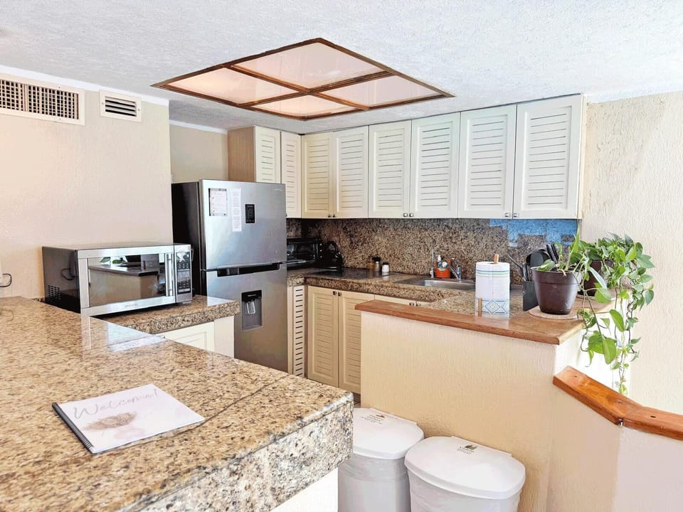 Kitchen - When you stand in the kitchen, you have views of the ocean, the beach, and the bay, depending on which way you look.