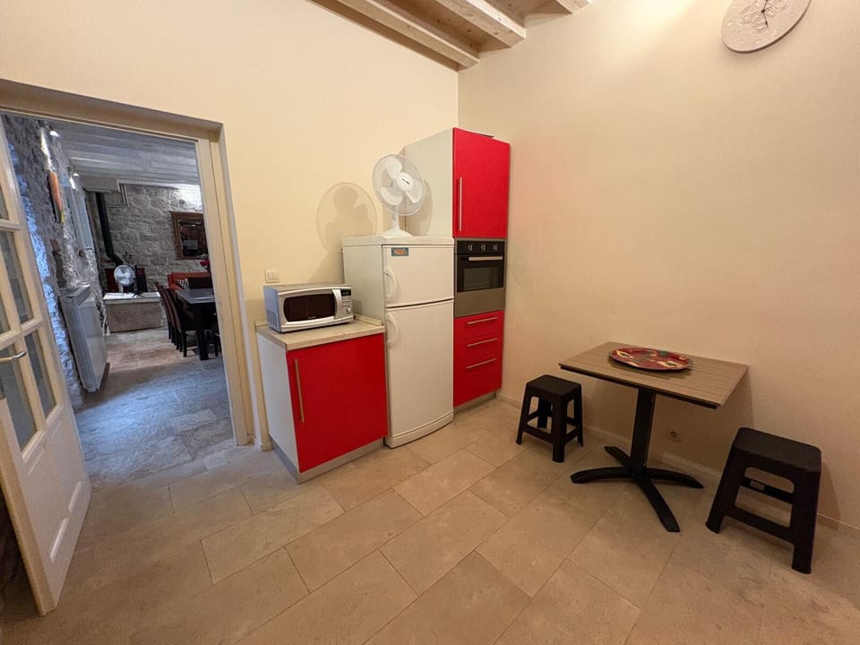 Additional fridge is on the second floor. Door to Dining and Living room.