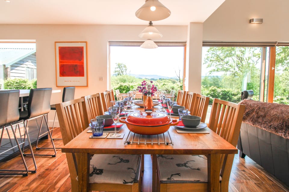Comfortable dining for eight with dimmable lights
