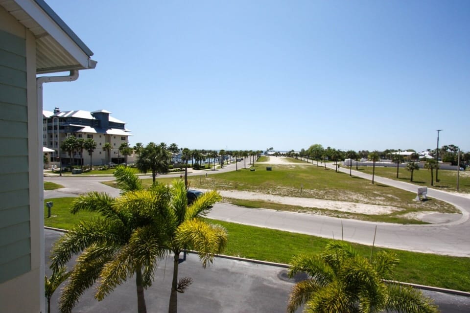 First Floor Queen Room Balcony View of Marina, Bay, Beach & Resort Area