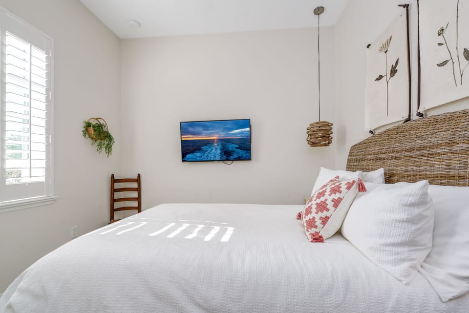 One of the Queen Bedrooms on the 2nd Floor with TV.