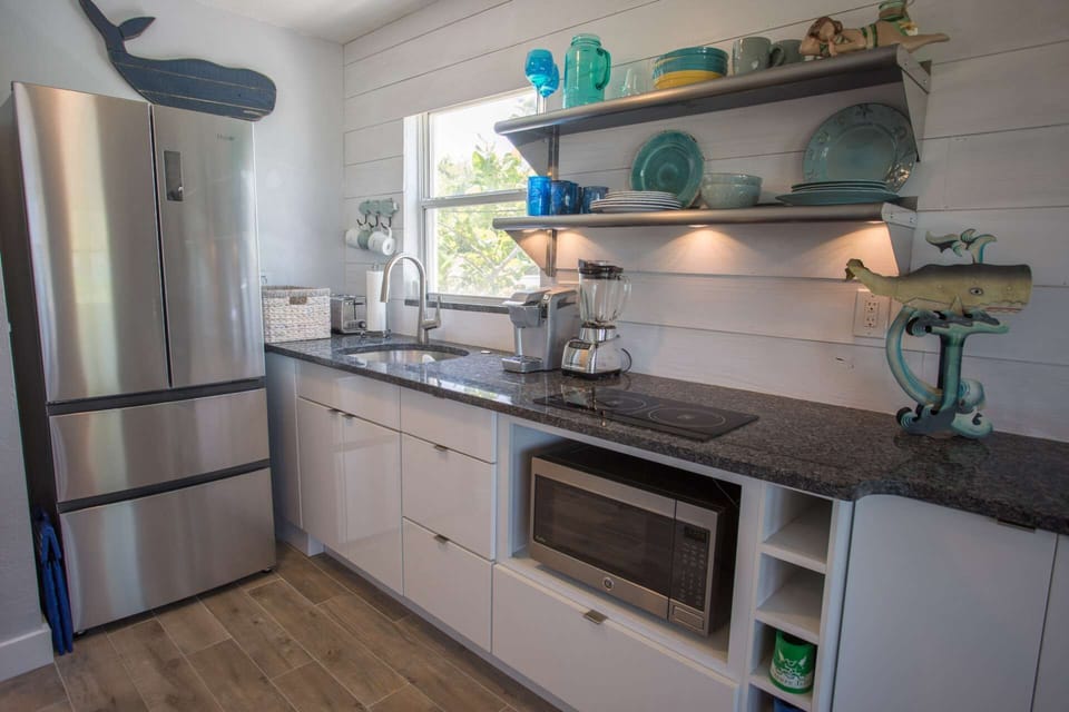 Updated Kitchen with Granite Counter Tops, Stainless Appliances, Convection Oven & Induction Stove Top