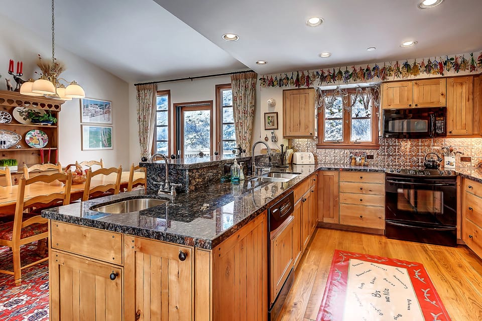 Fully Equipped Kitchen With Granite Countertops