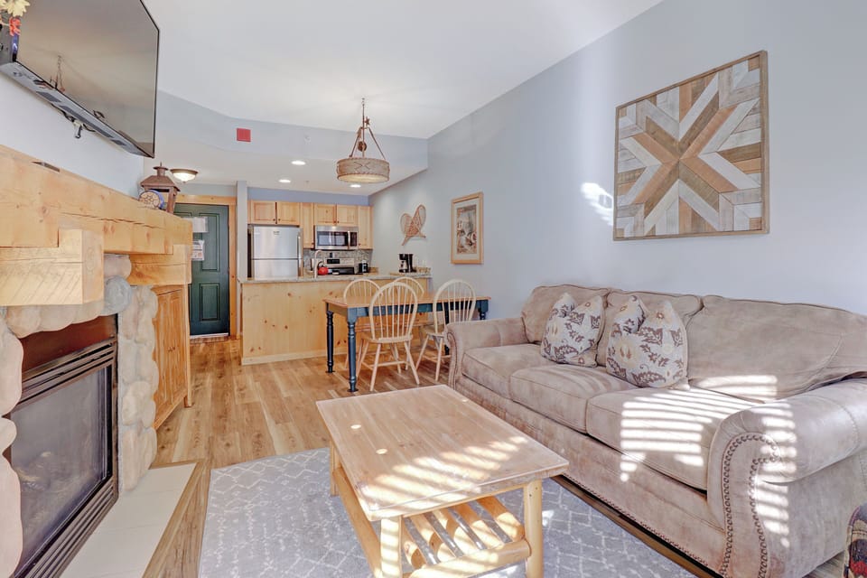 Relax in your cozy mountain retreat where warm wood accents and soft natural light create the perfect atmosphere for unwinding after your adventures.