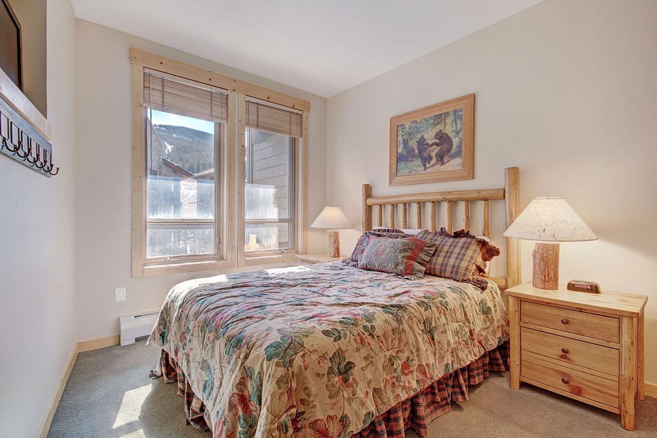 Bedroom offers large windows for plenty of natural light coming in.