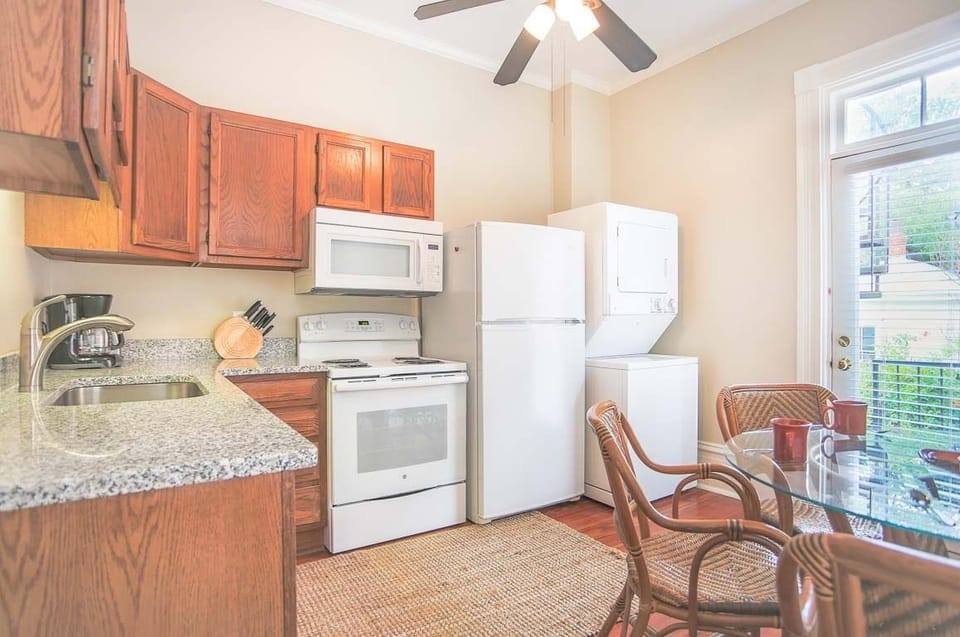 The full kitchen is stocked with all of the essentials.