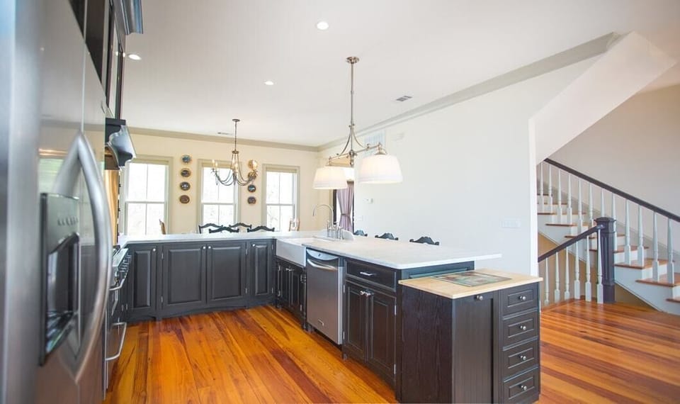 Open space between the dining room and the kitchen make it easy for everyone to be in one place at one time.