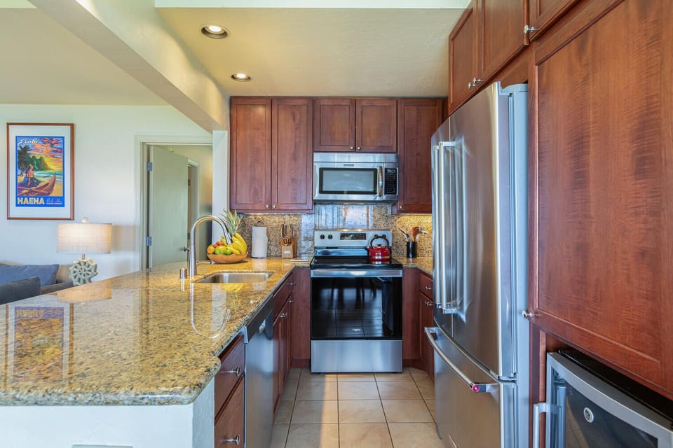 Kitchen has stainless steel appliances