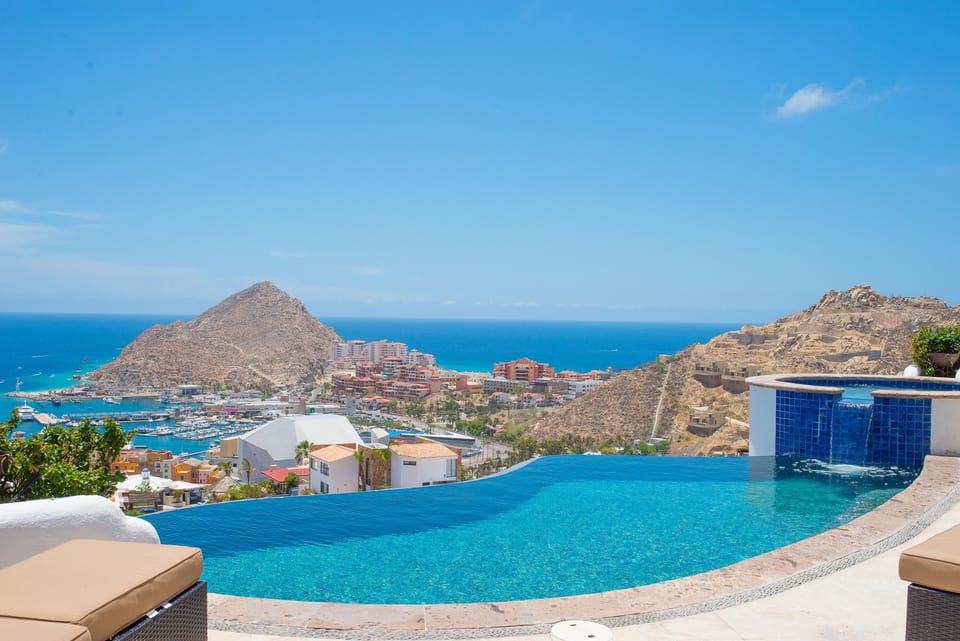 Infinity edge pool leads eye to marina view